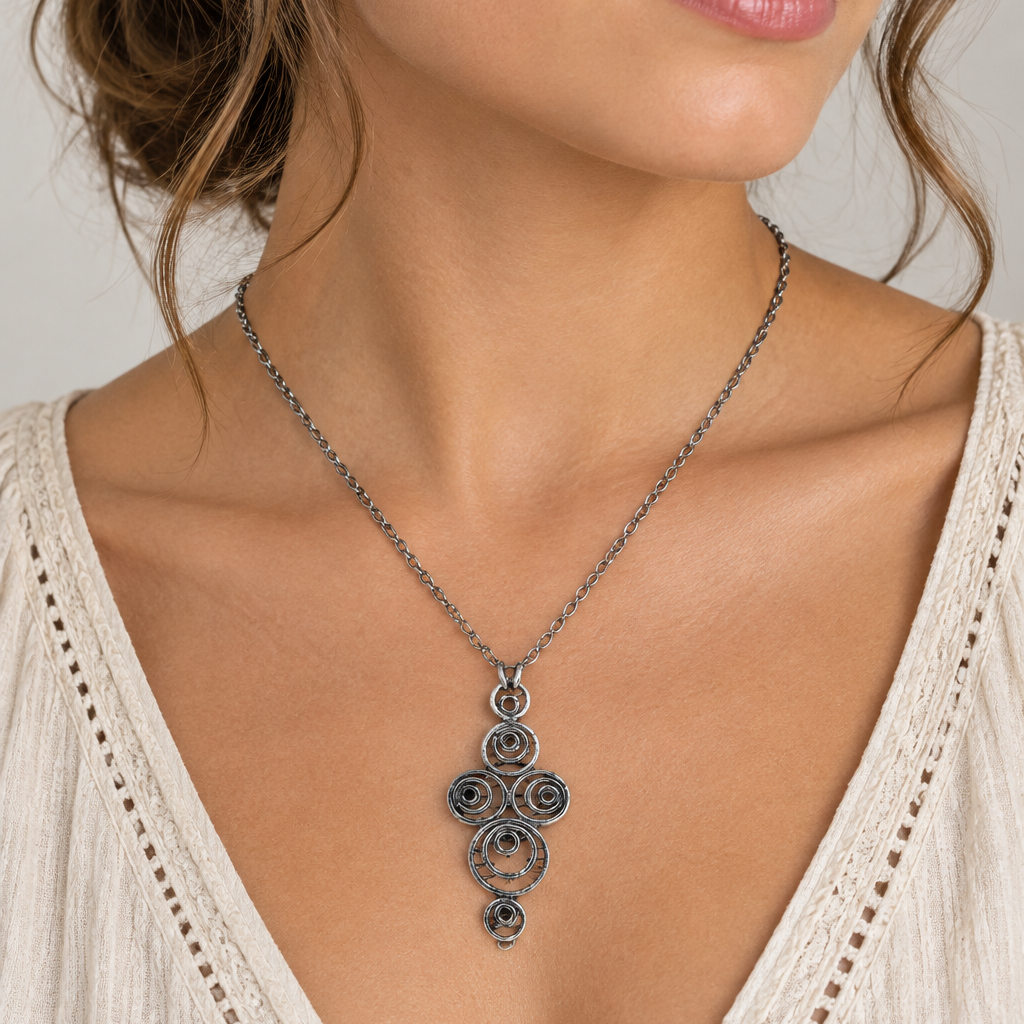 925 sterling silver Celtic spiral pendant necklace worn on woman's neck