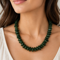 Green aventurine chip necklace worn on young woman neck lifestyle photo