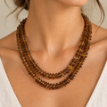 Natural brown amber agate chip necklace worn on young woman neck lifestyle photo