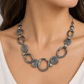 Necklace worn on woman's neck